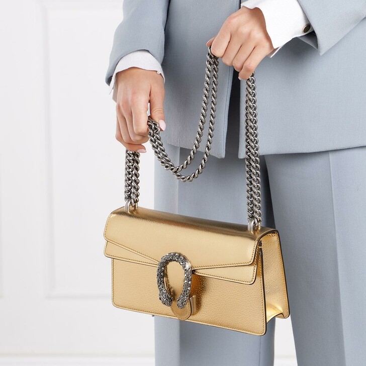 small gold leather handbag