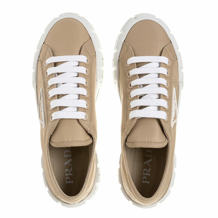 beige prada trainers
